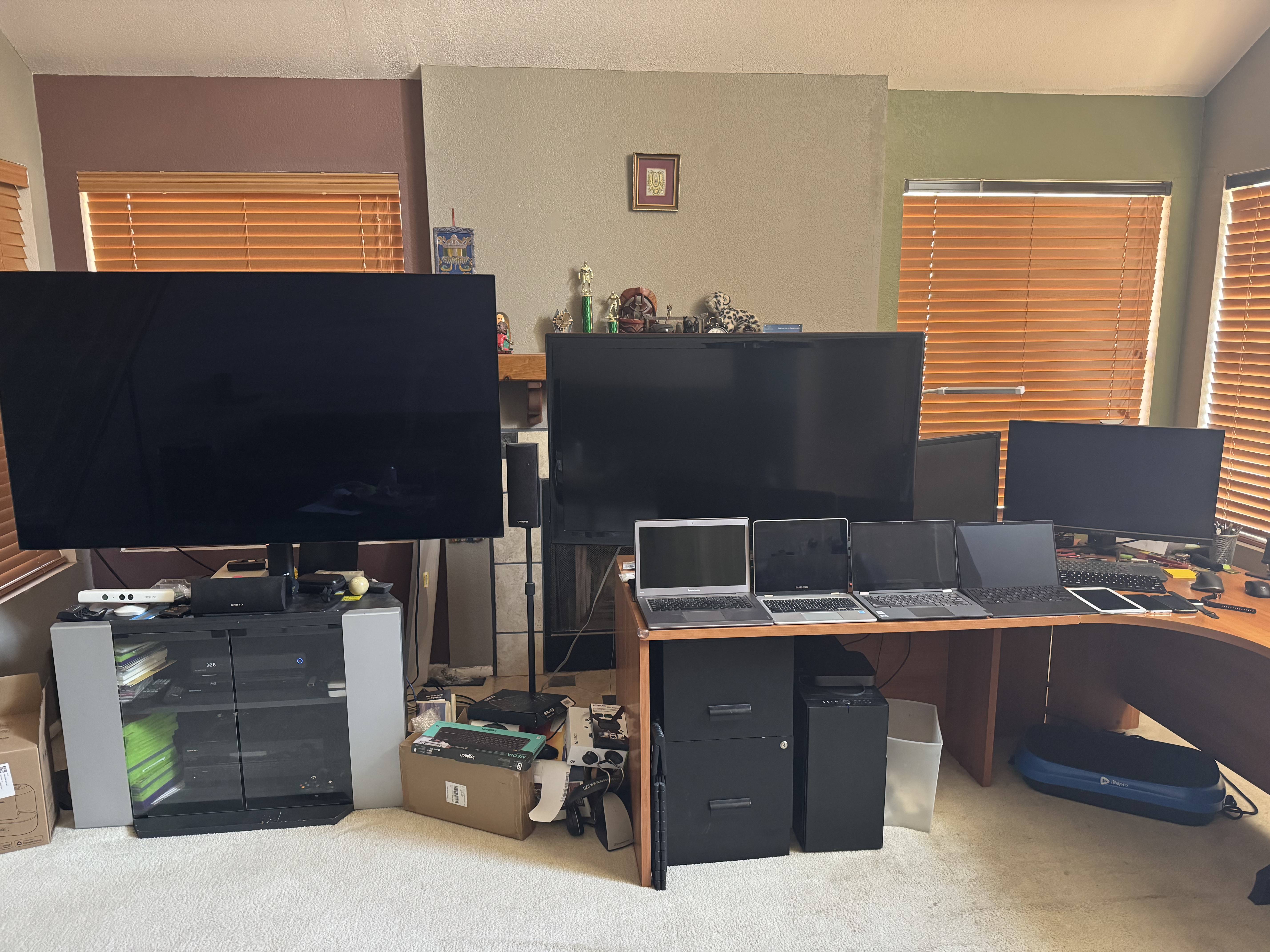 Office setup with multiple monitors and devices